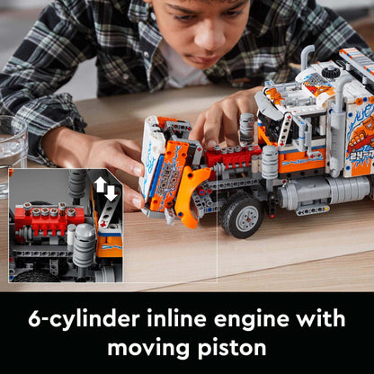 Child building LEGO® Technic Heavy-Duty Tow Truck with 6-cylinder inline engine and moving piston features.