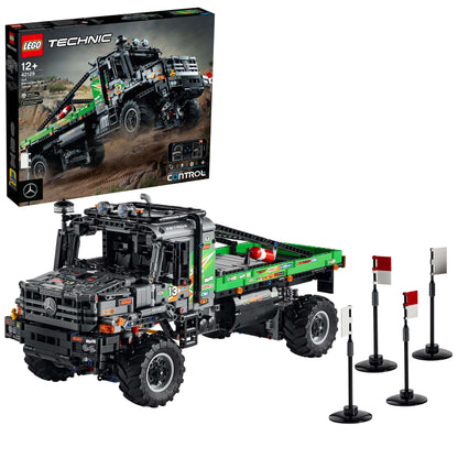 LEGO Technic 4x4 Mercedes-Benz Zetros Truck 42129 with box and trial obstacles for remote control play.