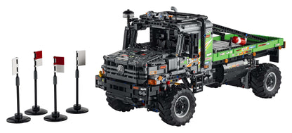 LEGO Technic 4x4 Mercedes-Benz Zetros Truck Toy 42129 with test flags, showcasing an authentic trial truck model.