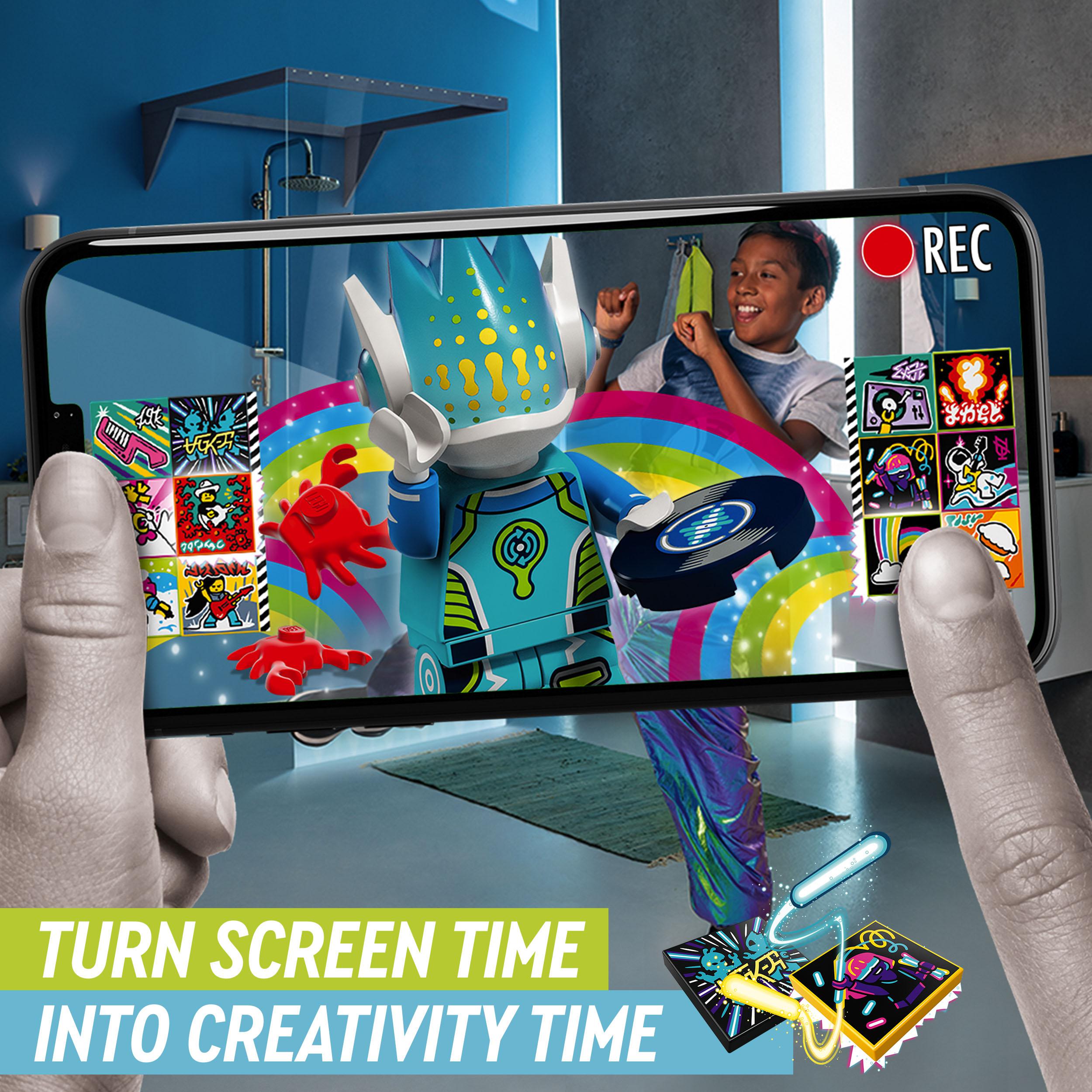 Child enjoying LEGO VIDIYO Alien DJ BeatBox, creating music video with vibrant graphics and interactive app.