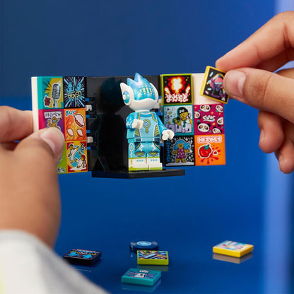 Child interacting with LEGO® VIDIYO™ Alien DJ BeatBox set, customizing music video scenes with stickers and character.