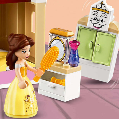 LEGO Disney Princess Belle in winter castle, playing with a hairbrush and vanity accessories for imaginative play.