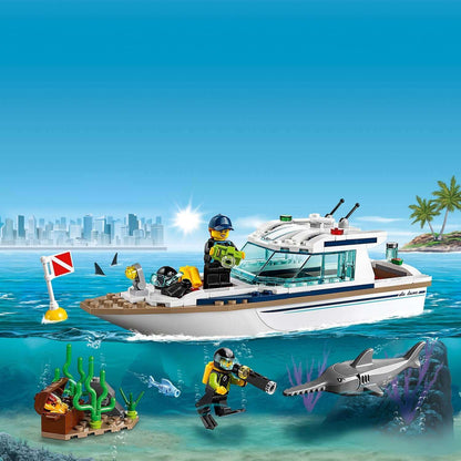 LEGO City Diving Yacht Set 60221 with underwater exploration, divers, and shark in vibrant ocean scene.