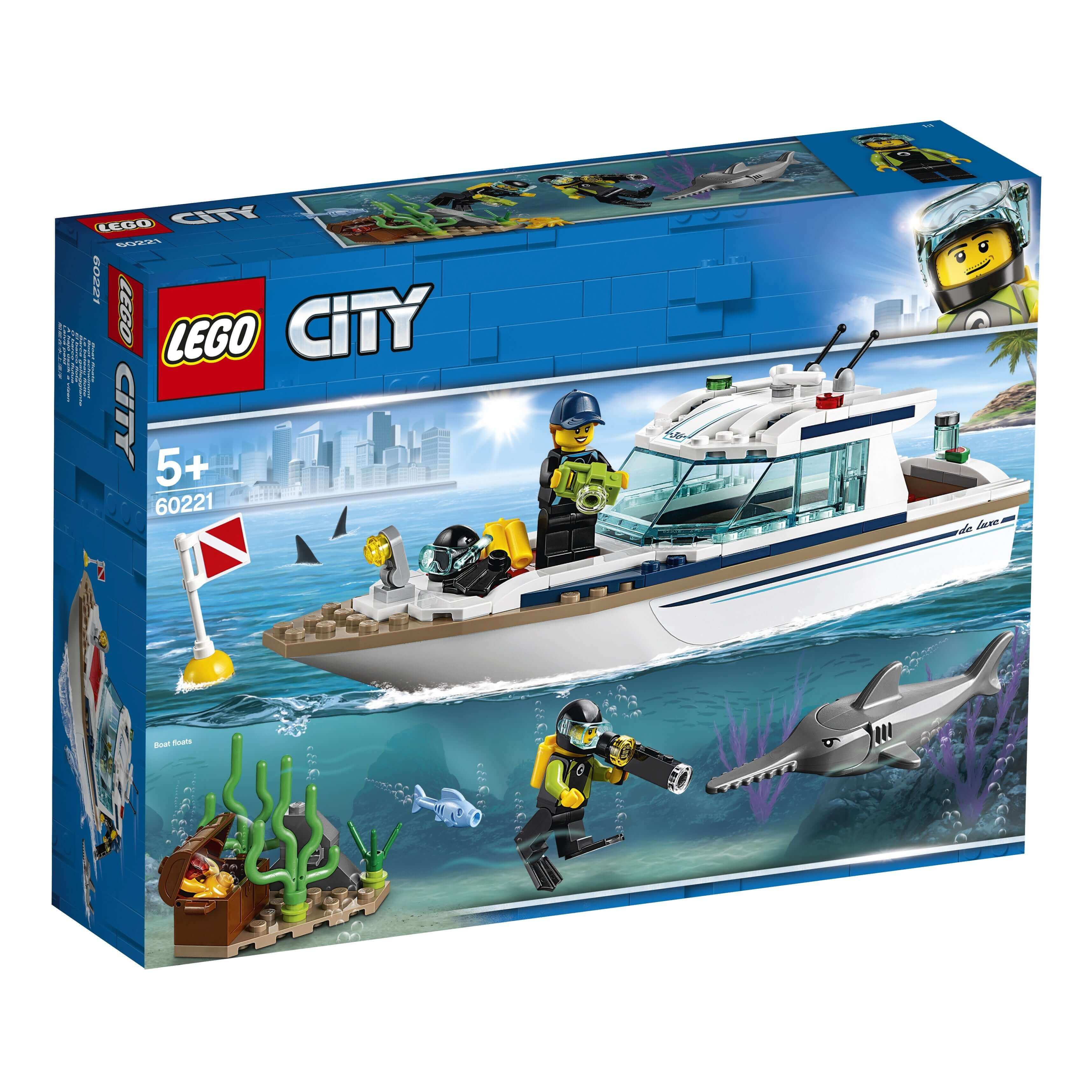 LEGO City Diving Yacht Set 60221 featuring a deep sea boat, scuba divers, and a shark in a vibrant underwater scene.