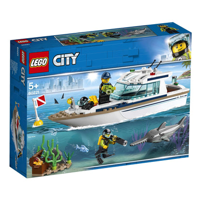 LEGO City Diving Yacht Set 60221 featuring a deep sea boat, scuba divers, and a shark in a vibrant underwater scene.