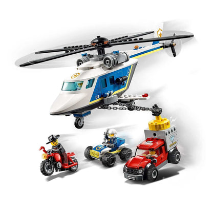LEGO® City Police Helicopter Chase Set 60243 with helicopter, police car, and getaway truck for kids' play.