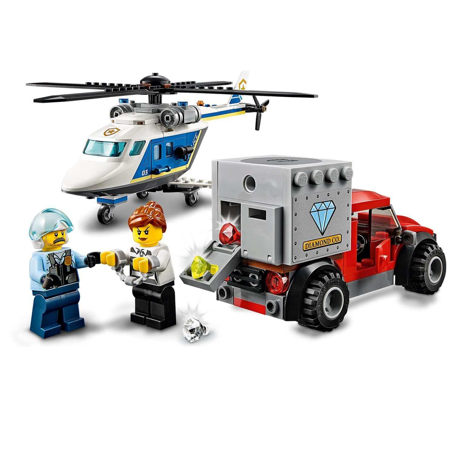 LEGO® City Police Helicopter Chase Set 60243 with toy helicopter, truck, and two minifigures in action.