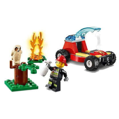LEGO® City Forest Fire Buggy Toy 60247 featuring a firefighter, flames, and an owl on a tree base.