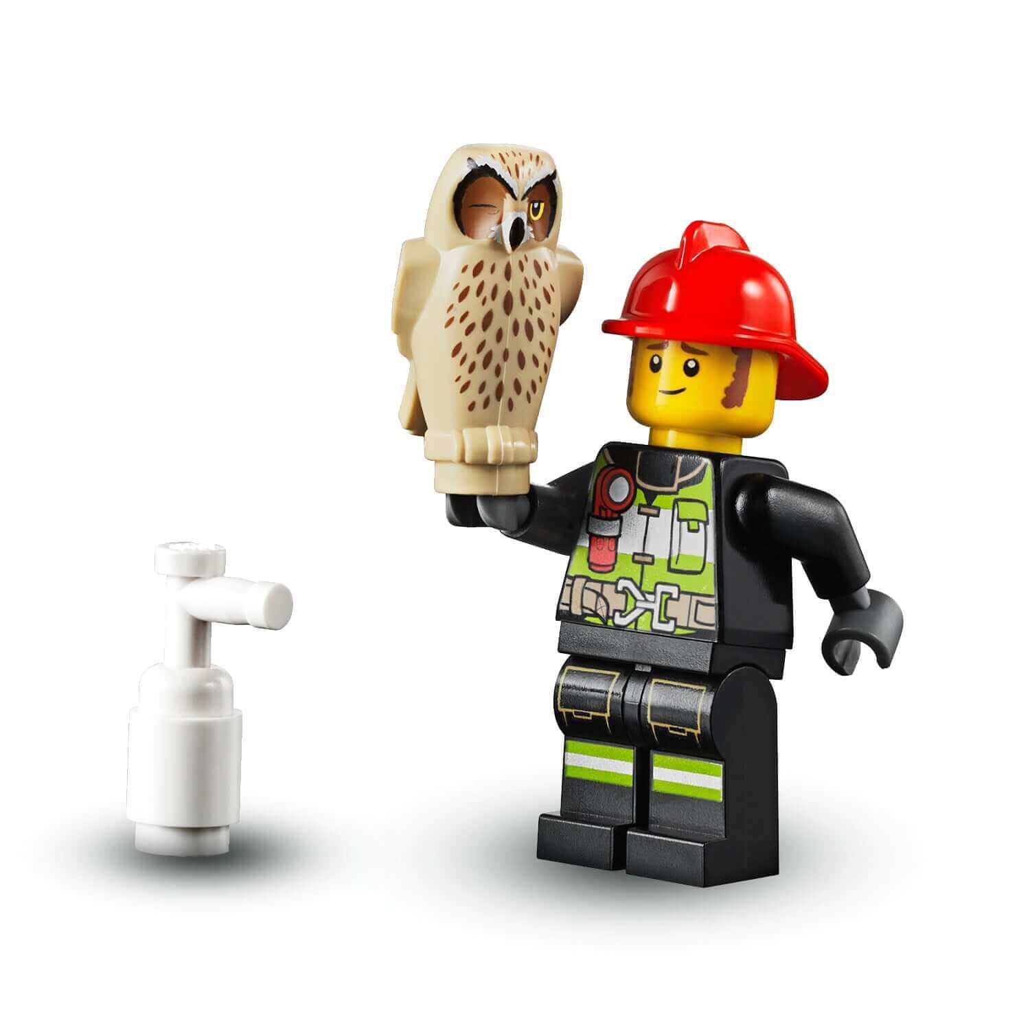 LEGO® City fireman minifigure holding an owl, part of the forest fire buggy toy set 60247 for kids.