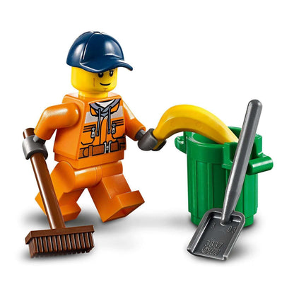 LEGO City street sweeper minifigure with broom and trash can, promoting imaginative play for kids.