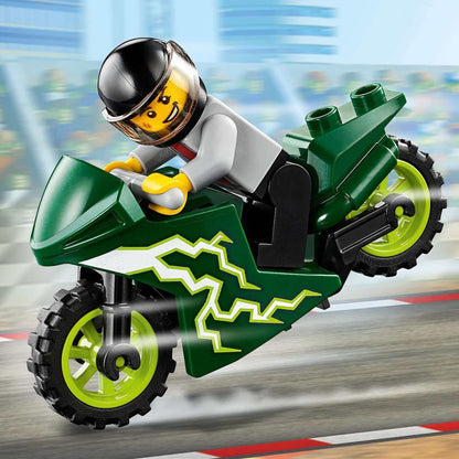 LEGO® City Nitro Wheels Stunt Team minifigure on a green motorcycle performing a stunt.
