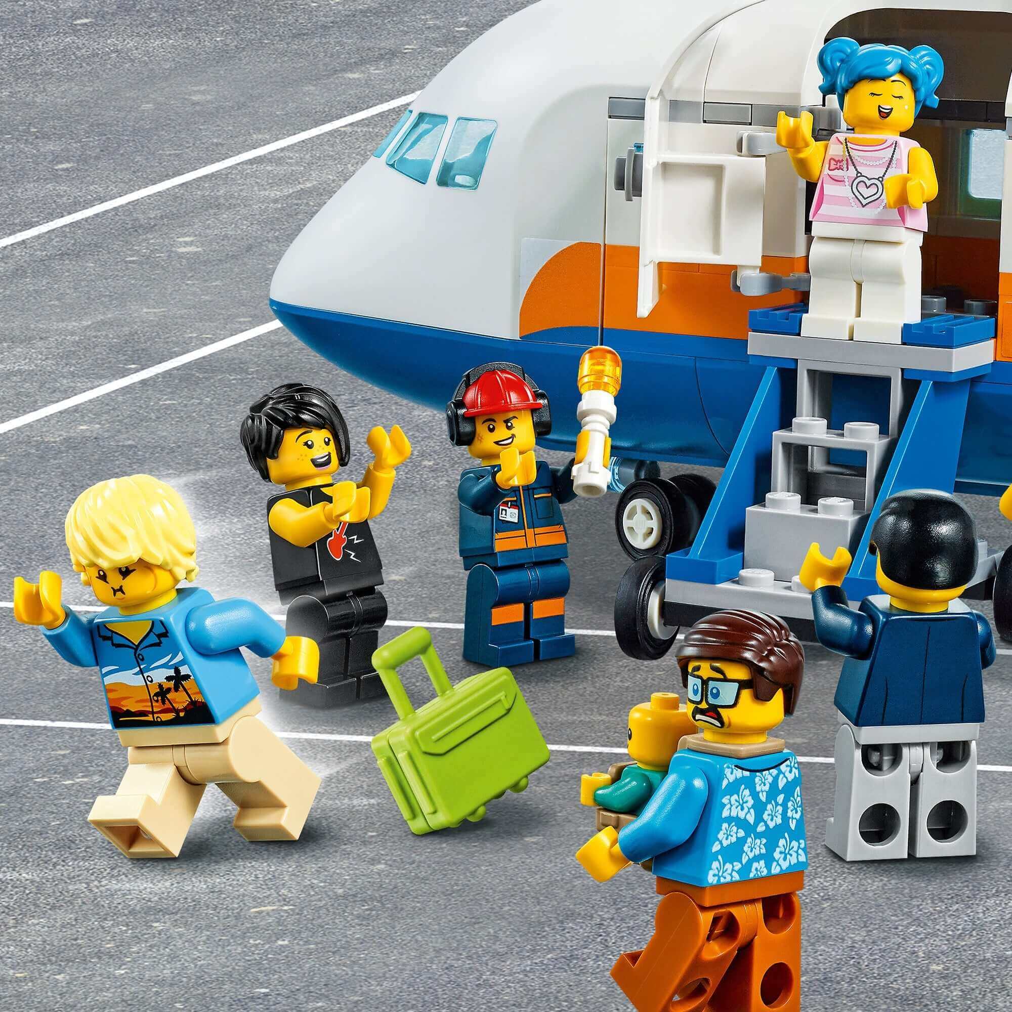 LEGO® City Airport Passenger Airplane with mini-figures, vacationers, and a cool automobile at the airport.