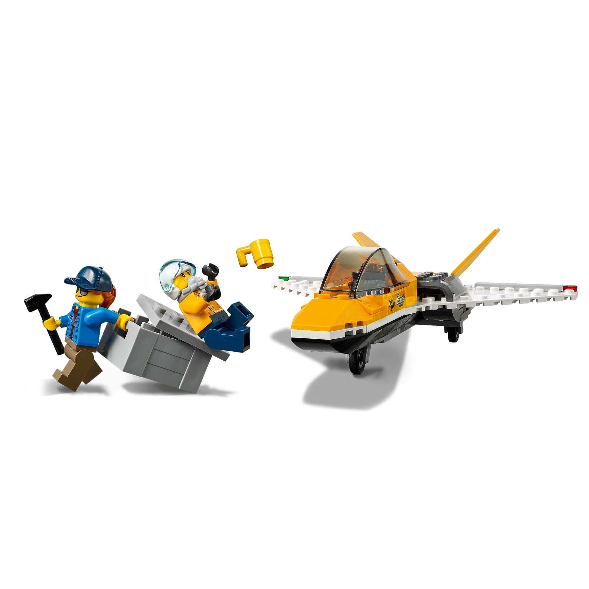 LEGO City Airshow Jet Transporter Toy 60289 with two minifigures and a jet, promoting creativity and play.