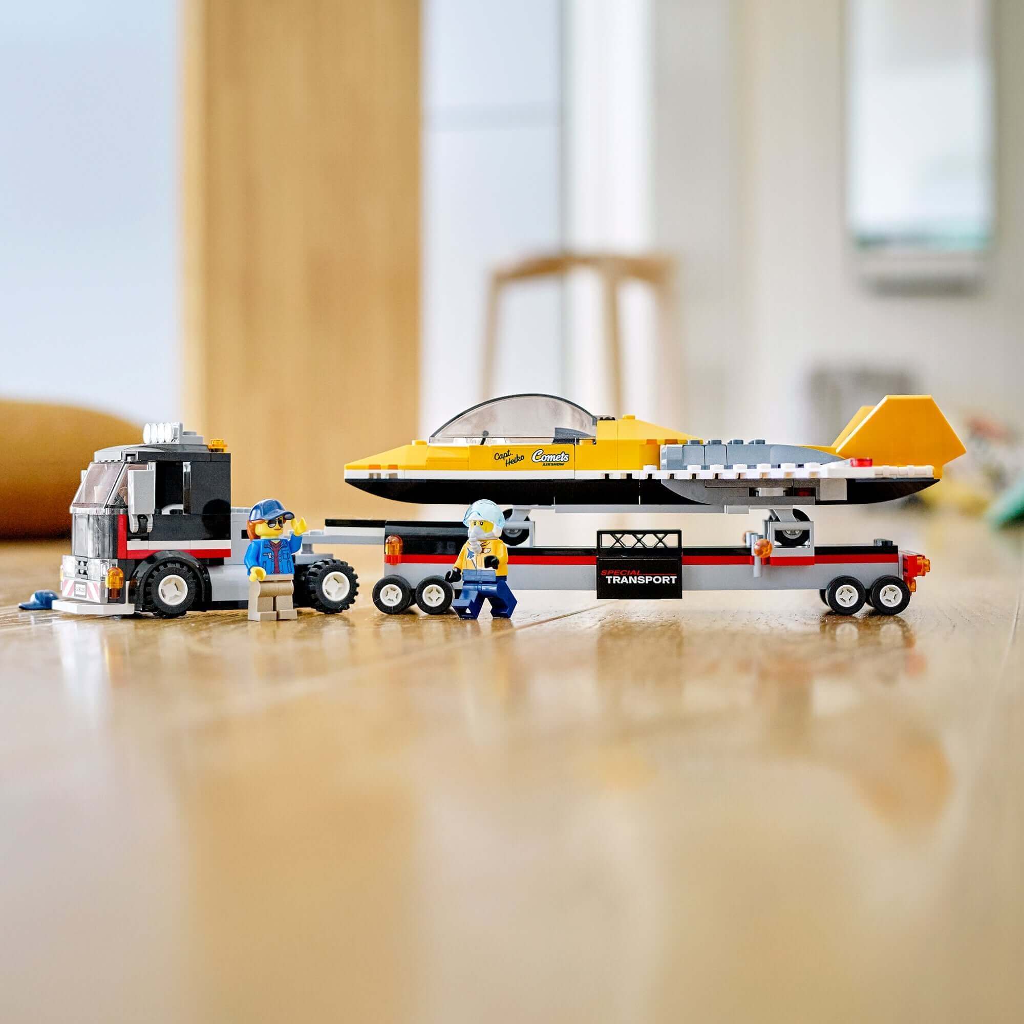 LEGO City Airshow Jet Transporter Toy 60289 with minifigures and jet on a truck trailer for creative play.