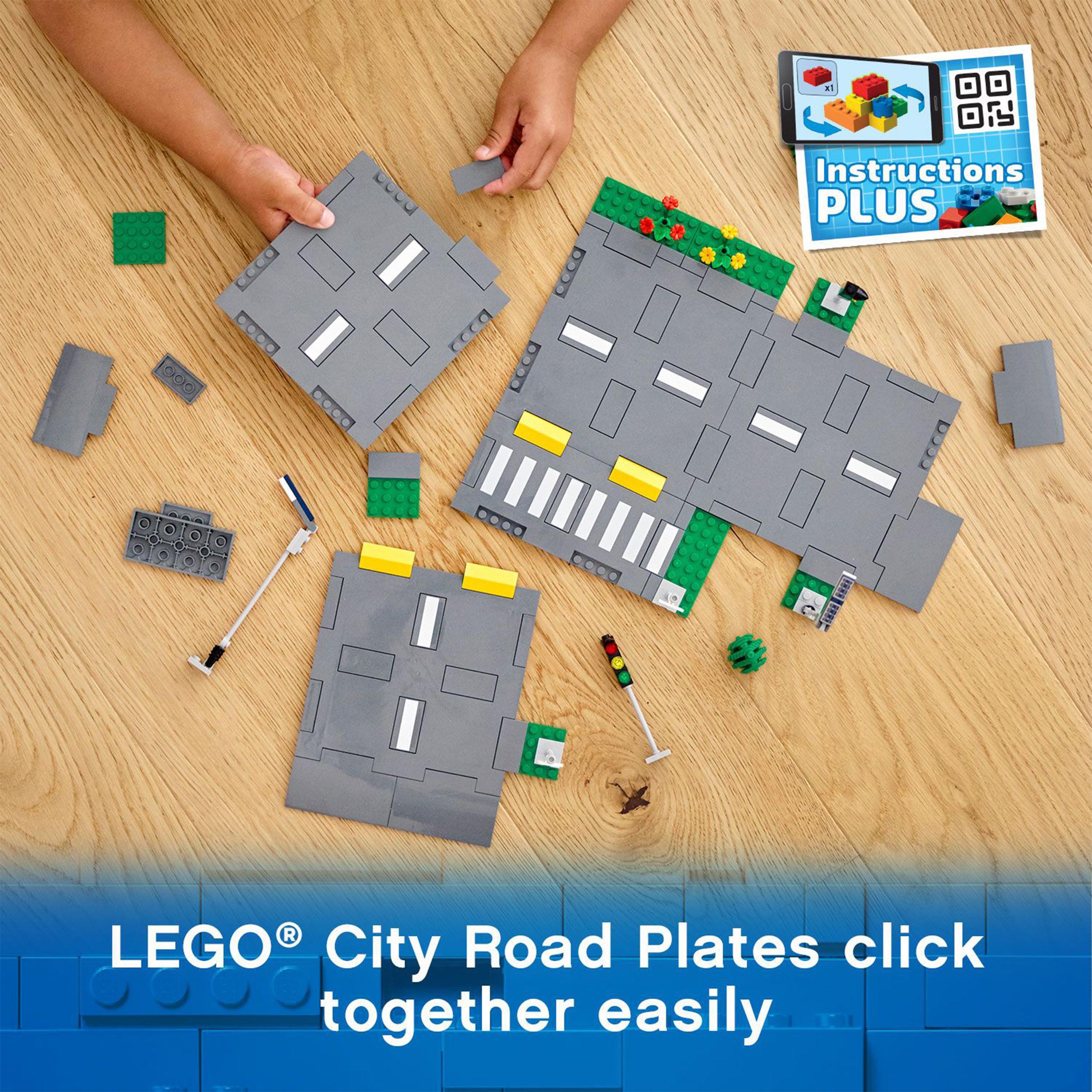 LEGO® City Road Plates set 60304 with streetlights, traffic signs, and instructions for easy assembly.