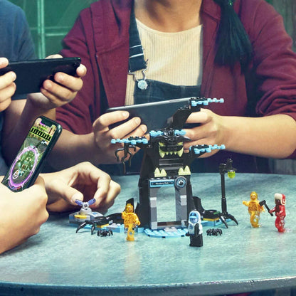Kids using smartphones and tablets to play with LEGO® Hidden Side set 70427, blending physical and digital play.