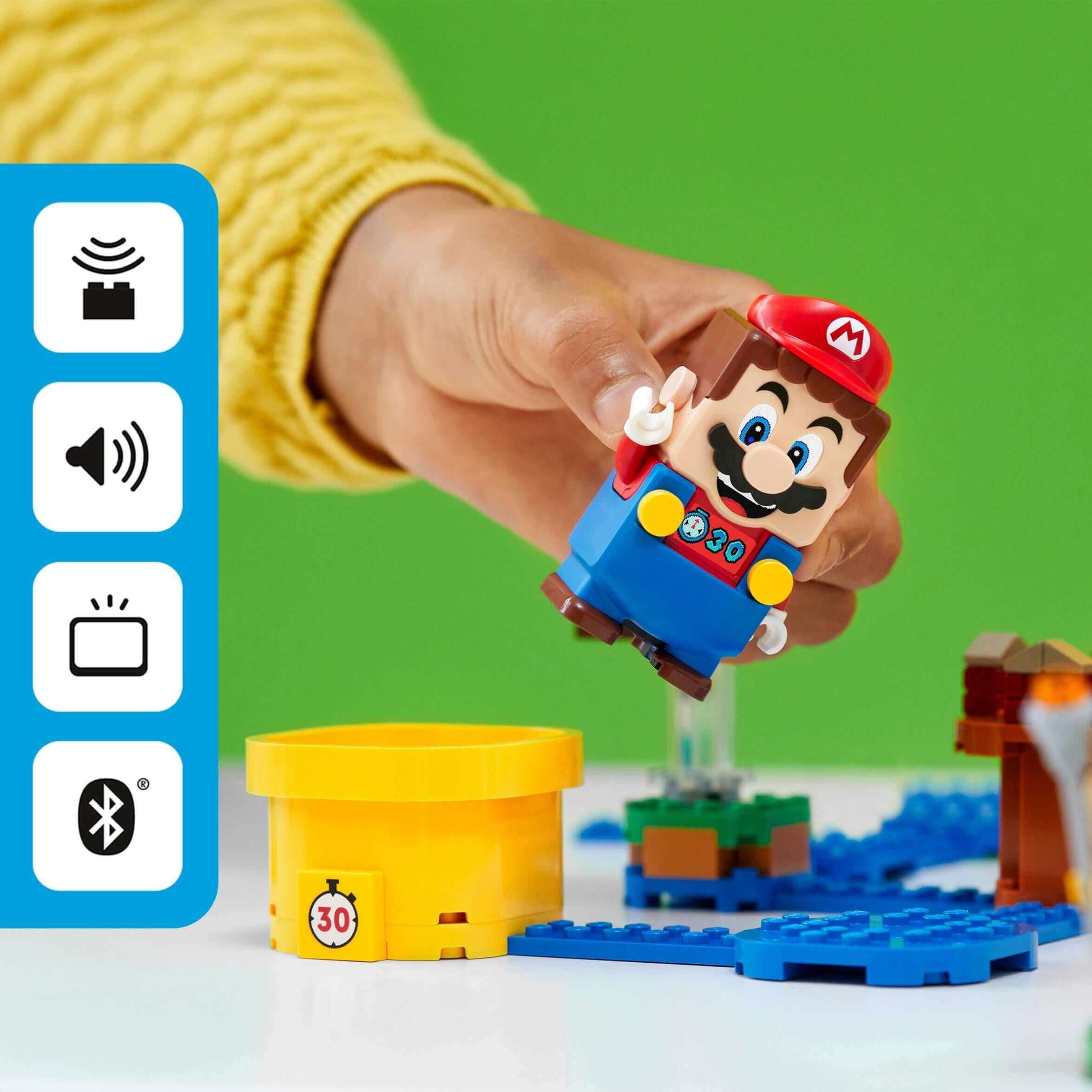 Child playing with LEGO® Mario figure from the Super Mario Master Adventure Maker Set 71380, enhancing creativity and fun.