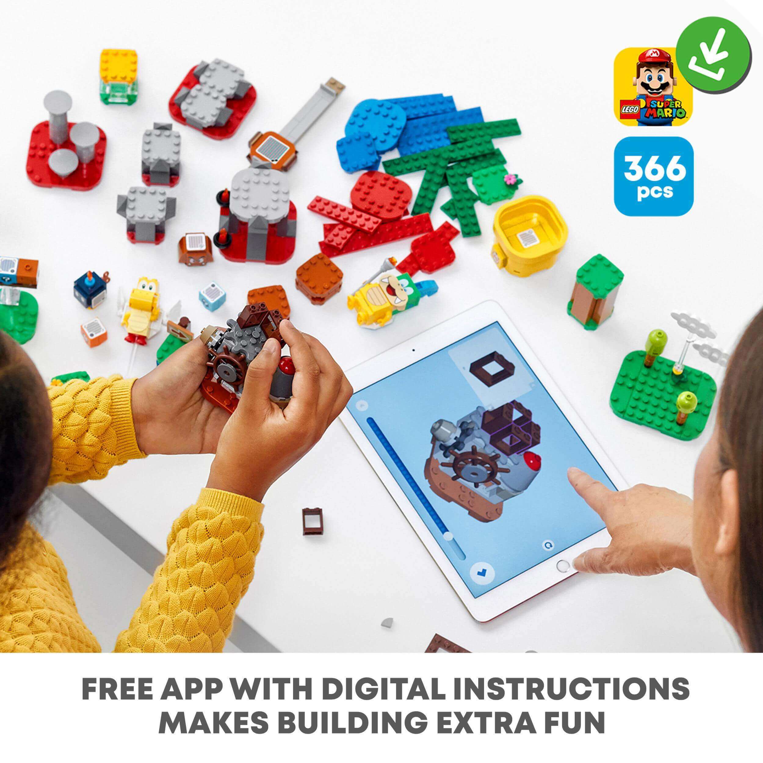 Kids using a tablet with digital instructions to build LEGO® Super Mario Set 71380, surrounded by colorful bricks and pieces.