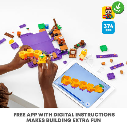 Child building with LEGO® Super Mario Poison Swamp Expansion Set 71383, using an app for digital instructions.