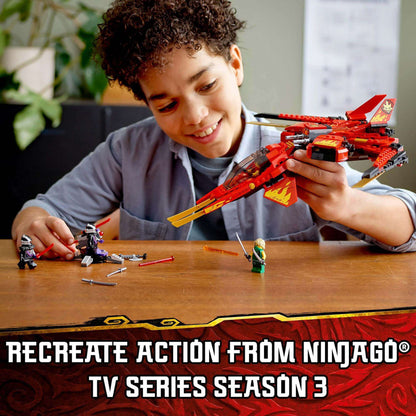 Boy playing with LEGO® NINJAGO Kai Fighter set, recreating scenes from TV series Season 3 with colorful figures.