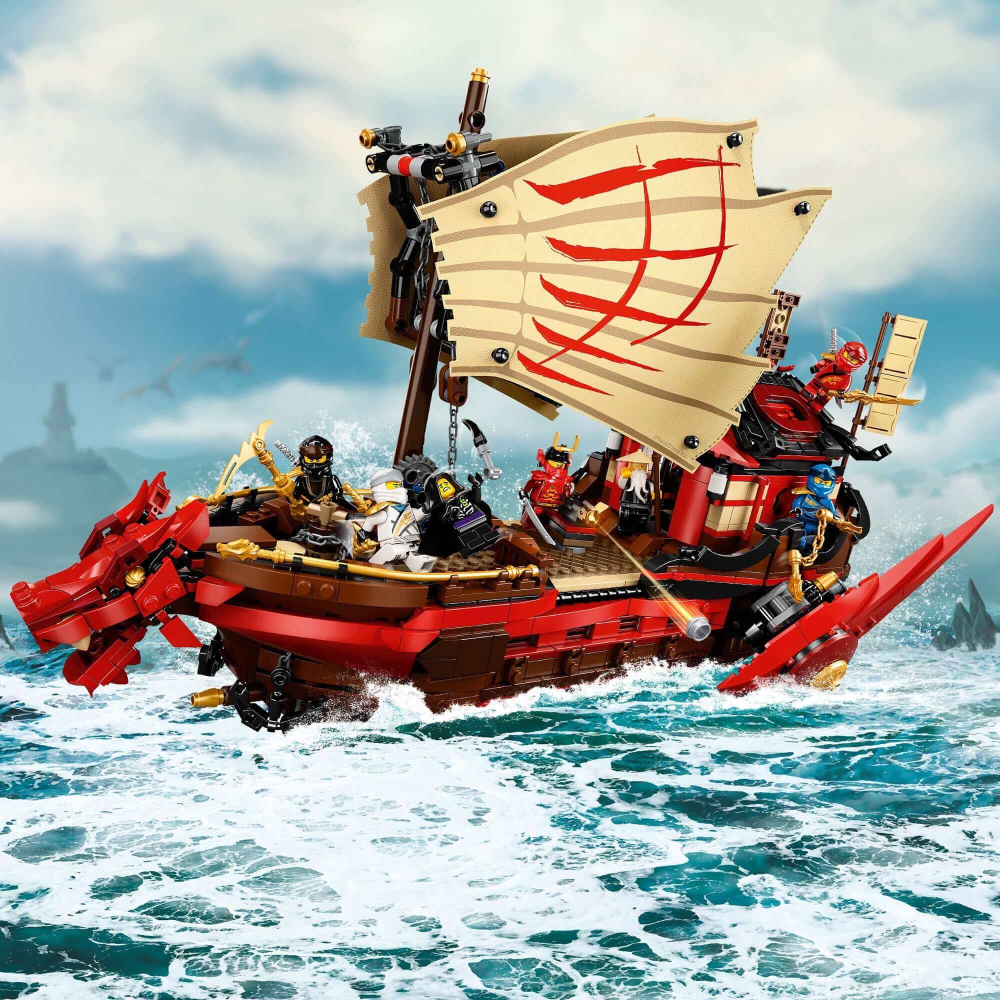 LEGO NINJAGO Destiny's Bounty ship set 71705 with minifigures sailing on the ocean, perfect for imaginative play.