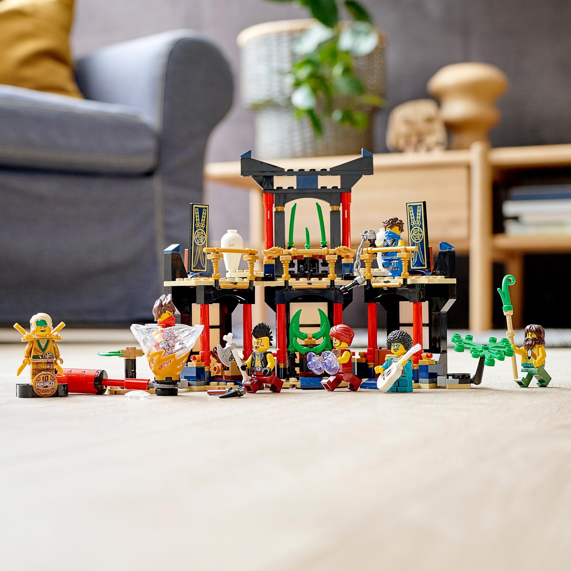 LEGO NINJAGO set 71735 featuring a temple with minifigures and weapons for roleplaying epic battles.