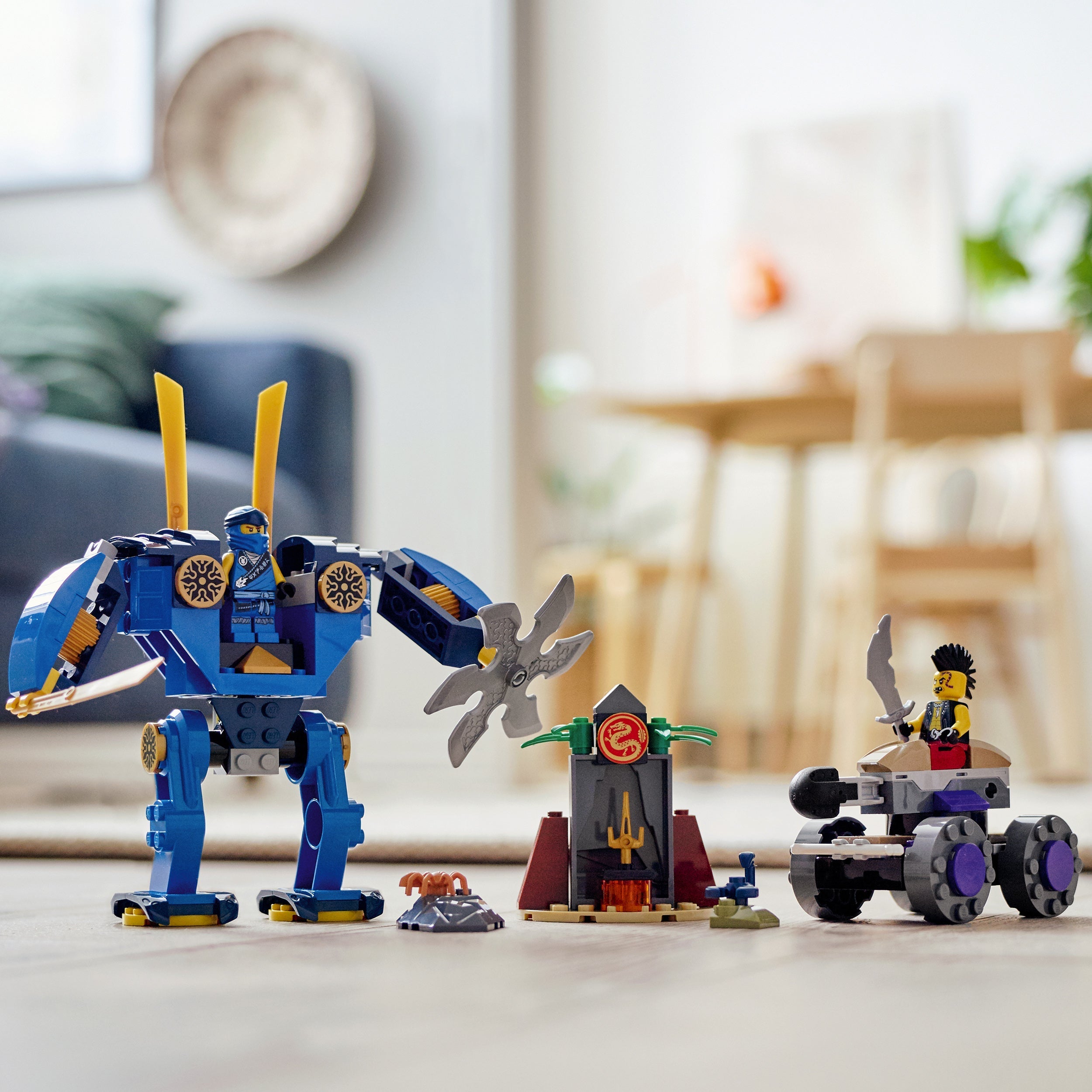 LEGO NINJAGO Legacy Jay’s Electro Mech Toy 71740 with mech, vehicle, and minifigures in a playroom setting.