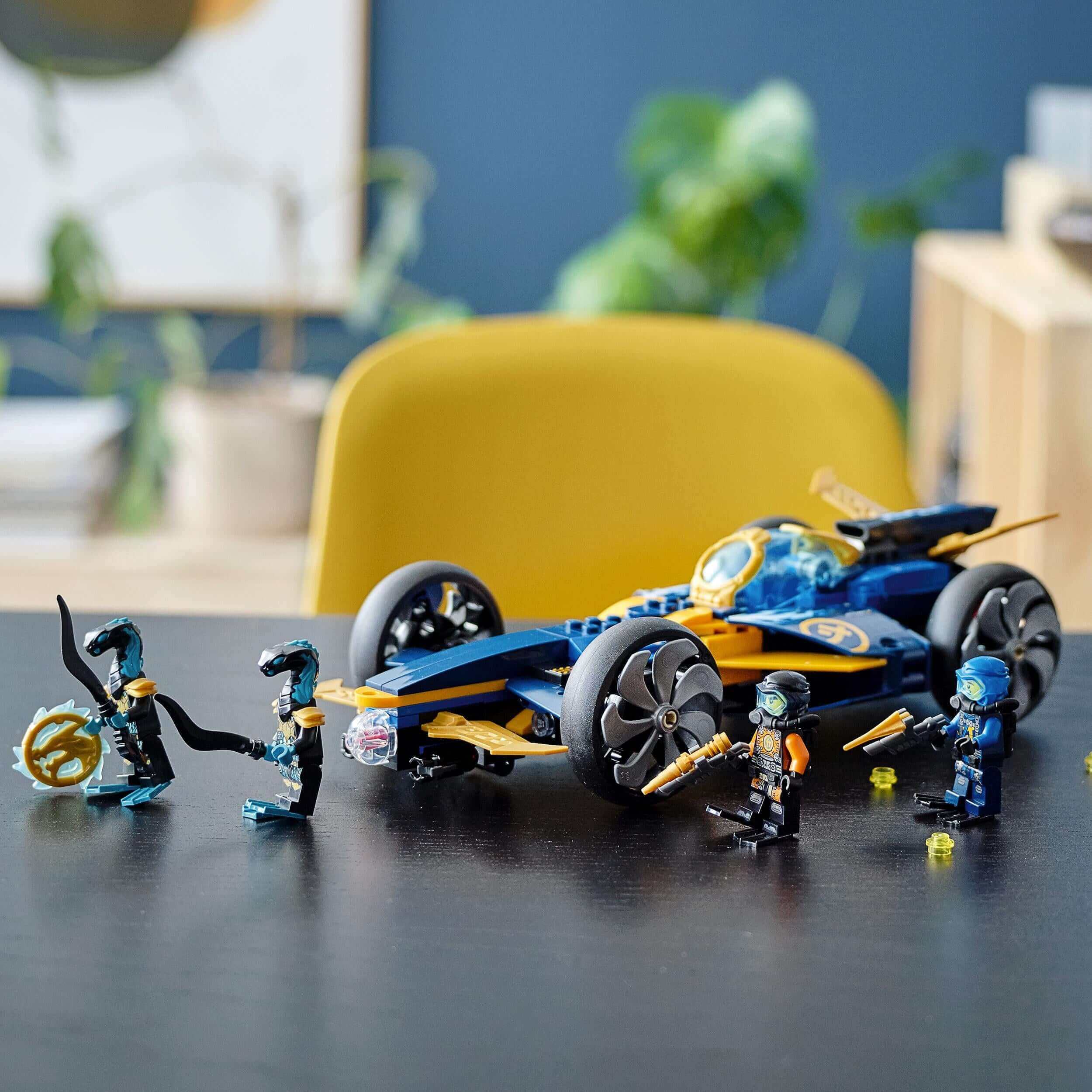 LEGO NINJAGO Ninja Sub Speeder Car toy 71752 with minifigures in action on a table.