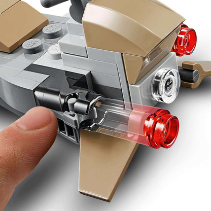 Close-up of LEGO Star Wars Mandalorian speeder with finger activating feature, showcasing creative building fun.