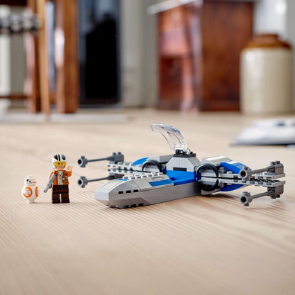LEGO® Star Wars Resistance X-Wing Building Set 75297 with pilot minifigure and BB-8 droid on wooden floor.