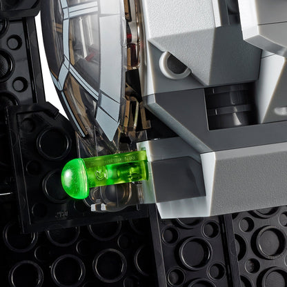 Close-up of LEGO Star Wars TIE Fighter's missile mechanism with a green missile detail.