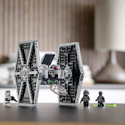 LEGO Star Wars Imperial TIE Fighter 75300 with minifigures and NI-L8 Protocol Droid on display.