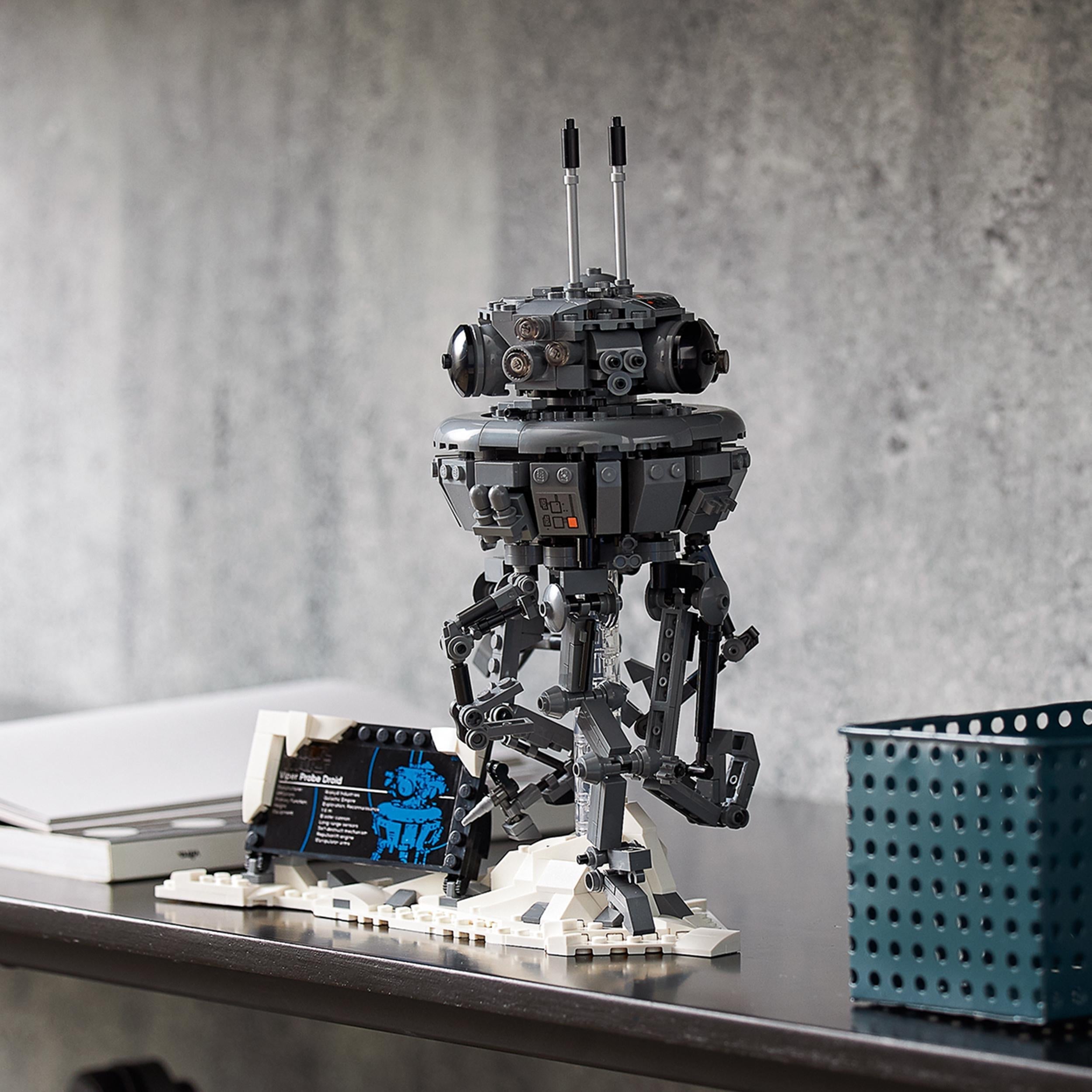 LEGO Star Wars Imperial Probe Droid set 75306 displayed on a table, showcasing intricate details and snowy Hoth scene.