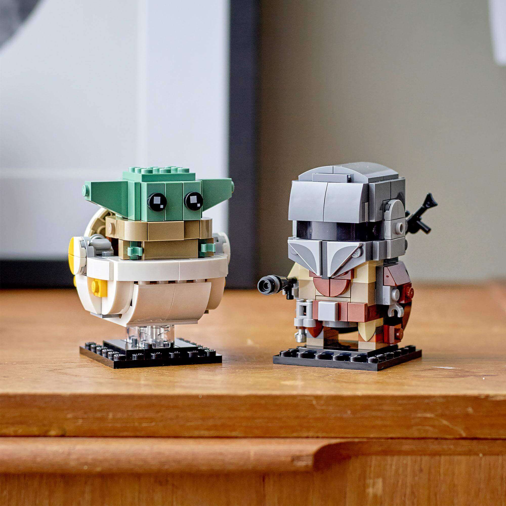 LEGO BrickHeadz Star Wars The Mandalorian 75317 set featuring The Mandalorian and the Child on display.