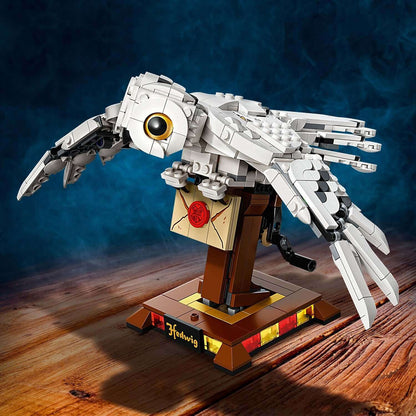 LEGO Harry Potter Hedwig building set 75979, featuring a detailed owl model with movable wings on a collectible stand.