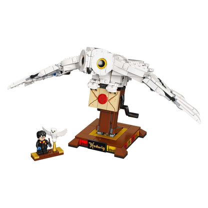LEGO® Harry Potter Hedwig Display Set 75979 featuring owl model with wings and Harry Potter minifigure.