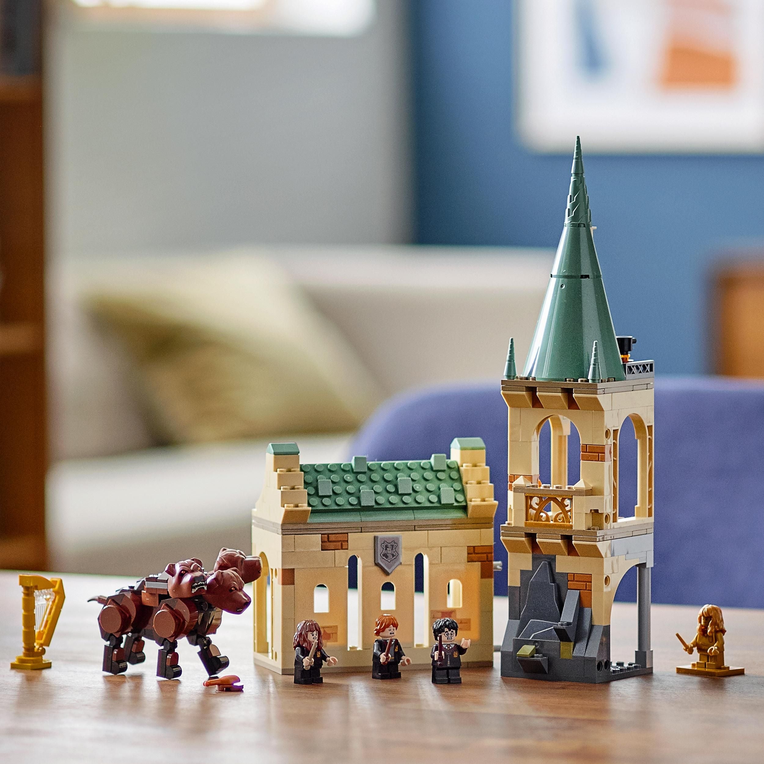 LEGO Harry Potter Hogwarts Fluffy Encounter playset with Hogwarts tower, Fluffy, and mini figures of Harry, Ron, and Hermione.