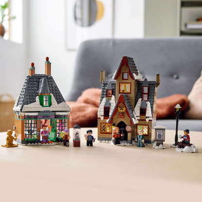 LEGO Harry Potter Hogsmeade Village Visit Set 76388 featuring colorful buildings and characters in a magical setting.