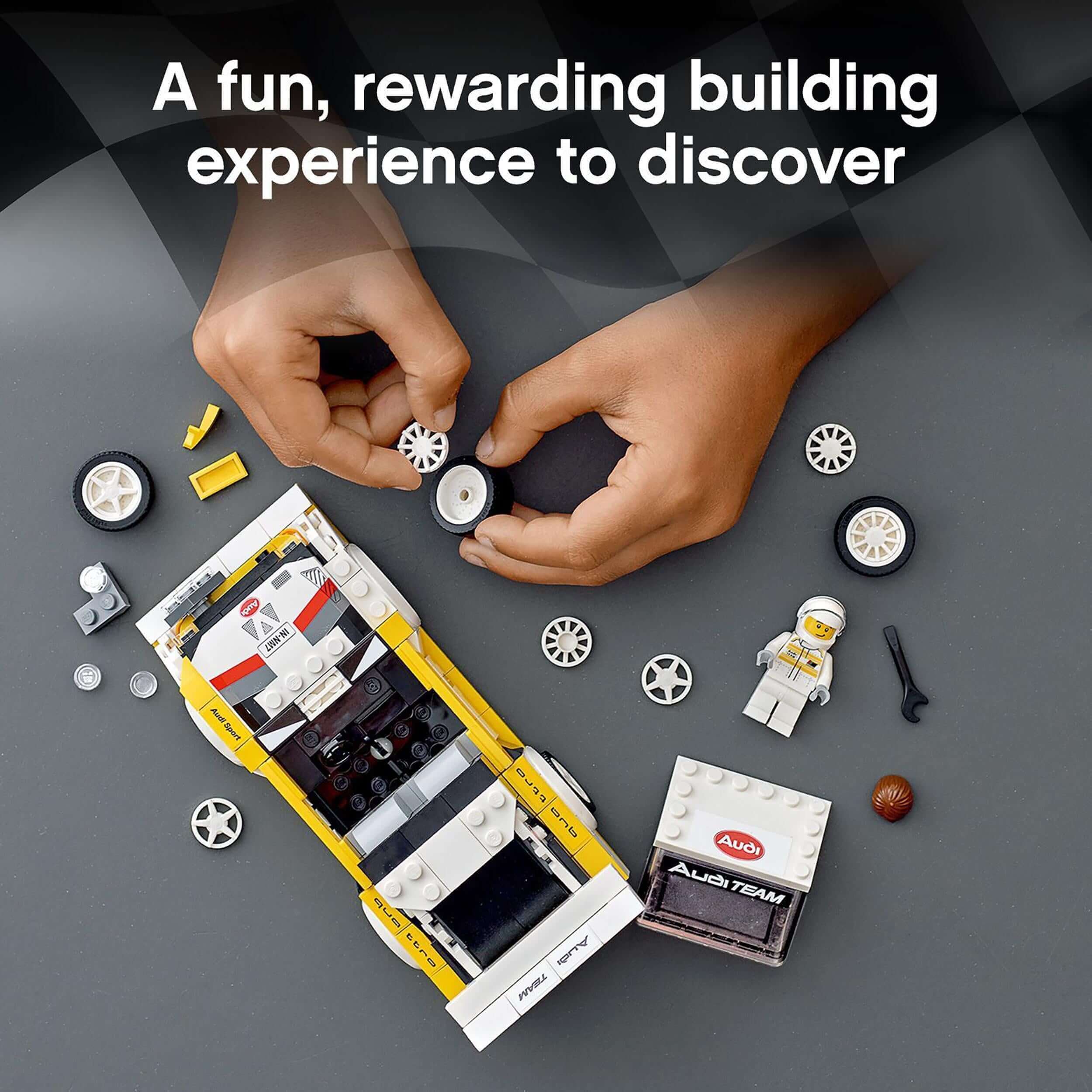 Hands assembling LEGO Audi Sport Quattro S1 model, showcasing a rewarding building experience with toy car parts.