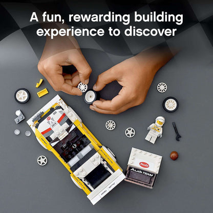 Hands assembling LEGO Audi Sport Quattro S1 model, showcasing a rewarding building experience with toy car parts.