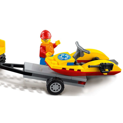 LEGO® City Beach Rescue ATV playset with water scooter and lifeguard minifigure on trailer.