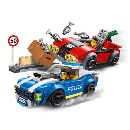 LEGO City Police Highway Arrest Set 60242 featuring Duke DeTain in a police car chasing thief Vito in a red car.