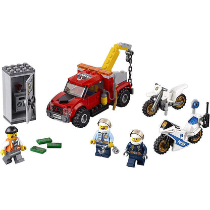 LEGO® City Police Tow Truck Trouble set 60137 featuring tow truck, bikes, crook, police figures, and safe.