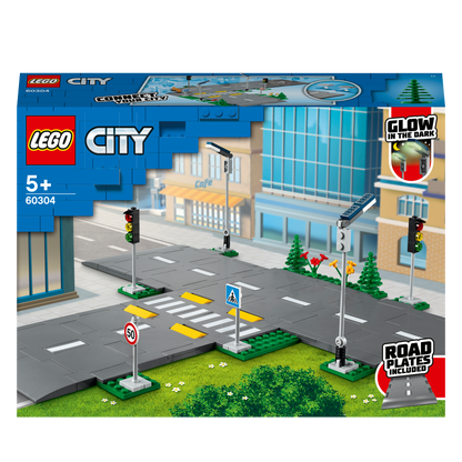 LEGO® City Road Plates Building Set 60304 with streetlights, traffic signs, and pedestrian crossing details.
