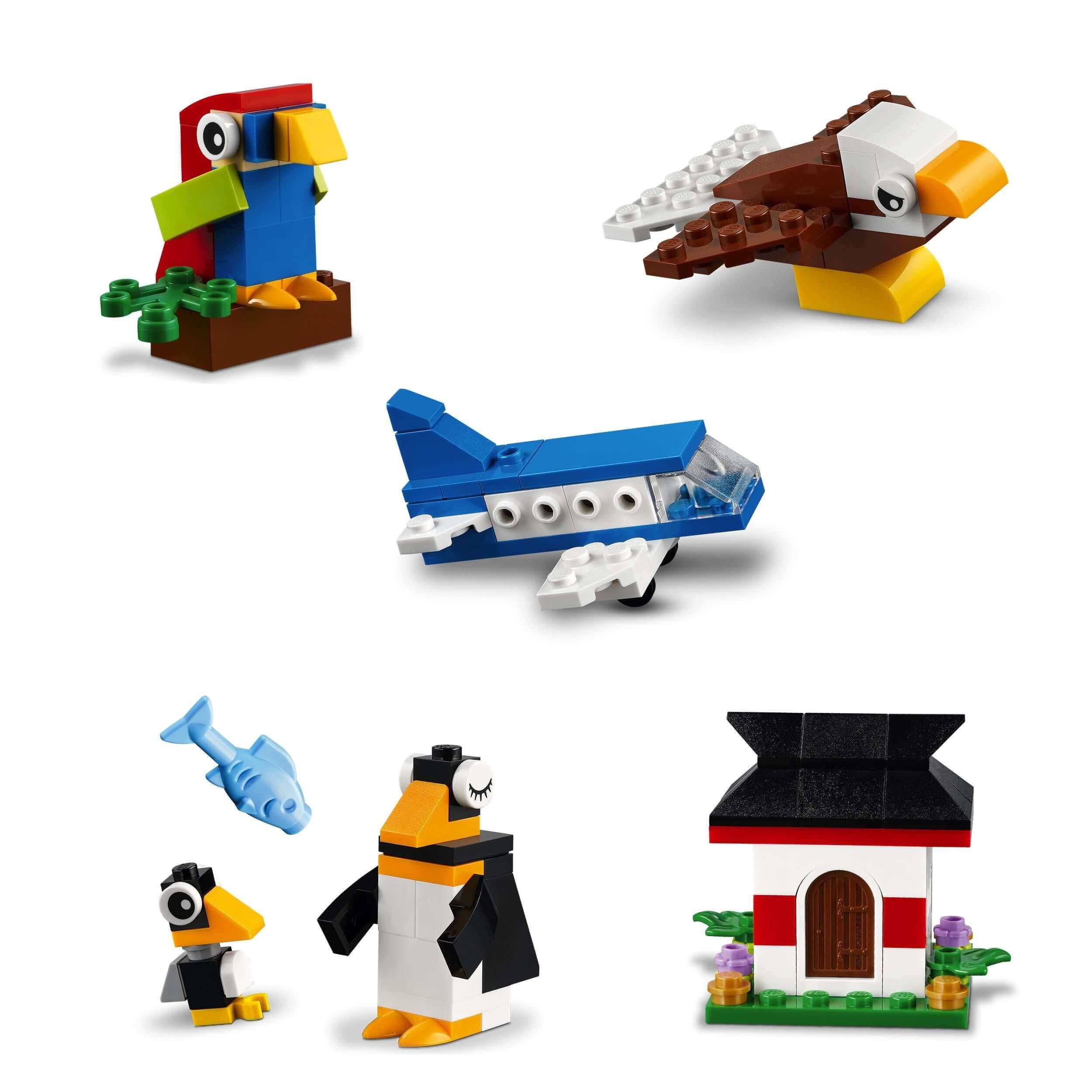 LEGO Classic Around the World set 11015 featuring colorful animals, a plane, and a house for creative play.