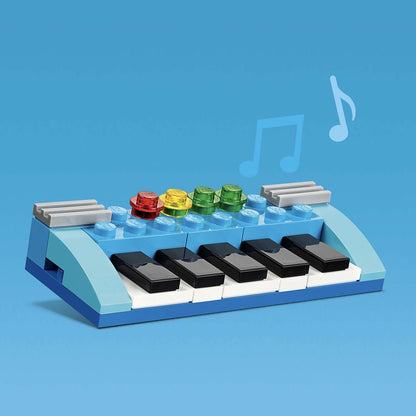 LEGO® Classic Bricks and Ideas Construction Toy 11001, colorful piano build with music notes, encouraging creativity.