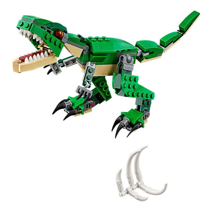 LEGO Creator 3-in-1 Mighty Dinosaurs T-Rex model with posable joints, claws, and open mouth, showcasing green bricks.