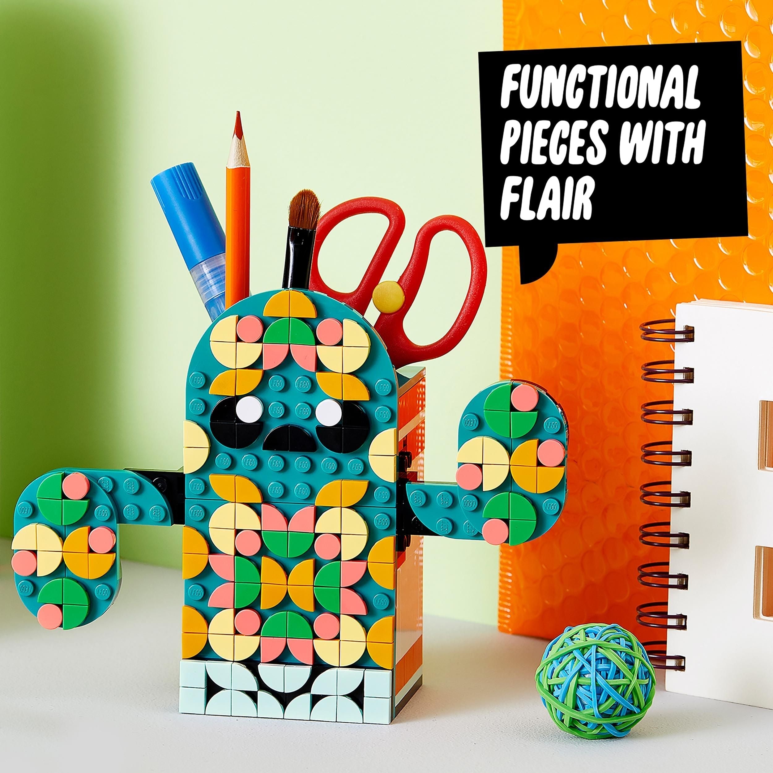 Colorful LEGO® cactus pencil holder displaying pens and scissors, showcasing creative design and functionality.