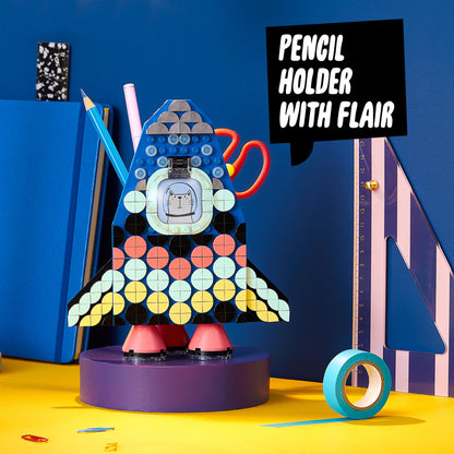 LEGO® DOTS Pencil Holder Craft Set for Kids 41936 featuring a vibrant rocket design with space for storage and display.