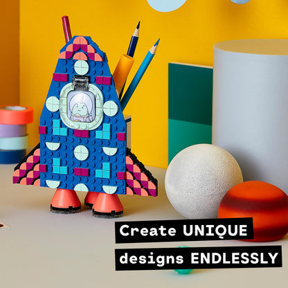 Colorful LEGO® DOTS Pencil Holder shaped like a rocket, ideal for kids to create unique designs with endless fun.